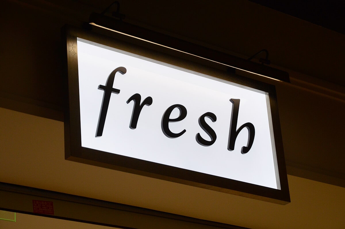 Storefront edge-lit light box signs